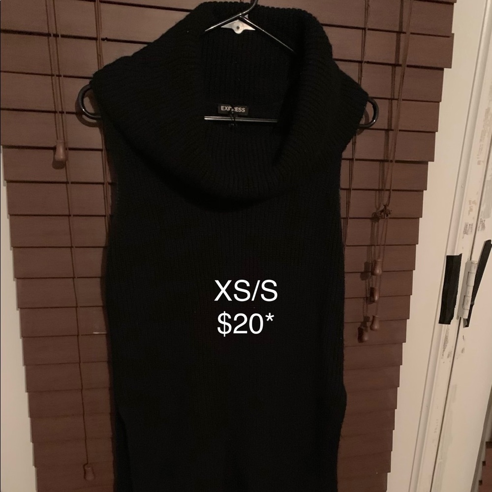 Black sleeveless turtle neck sweater